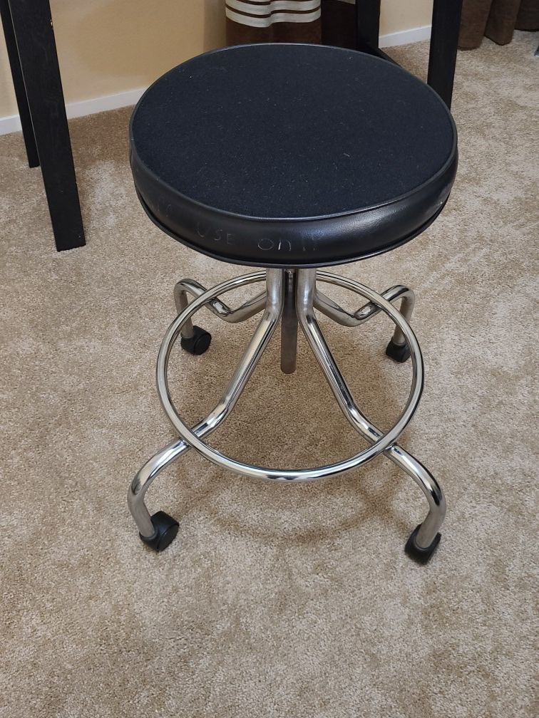 Adjustable black swivel stool