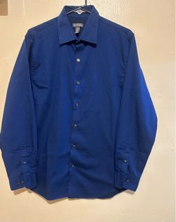 Men's Van Heusen shirt, size M, long-sleeved with navy blue and black stripes.