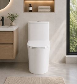 Brand new One-Piece Toilet 1.06 GPF/1.28 GPF Dual Flush ADA Height Elongated Toilet in Glossy White