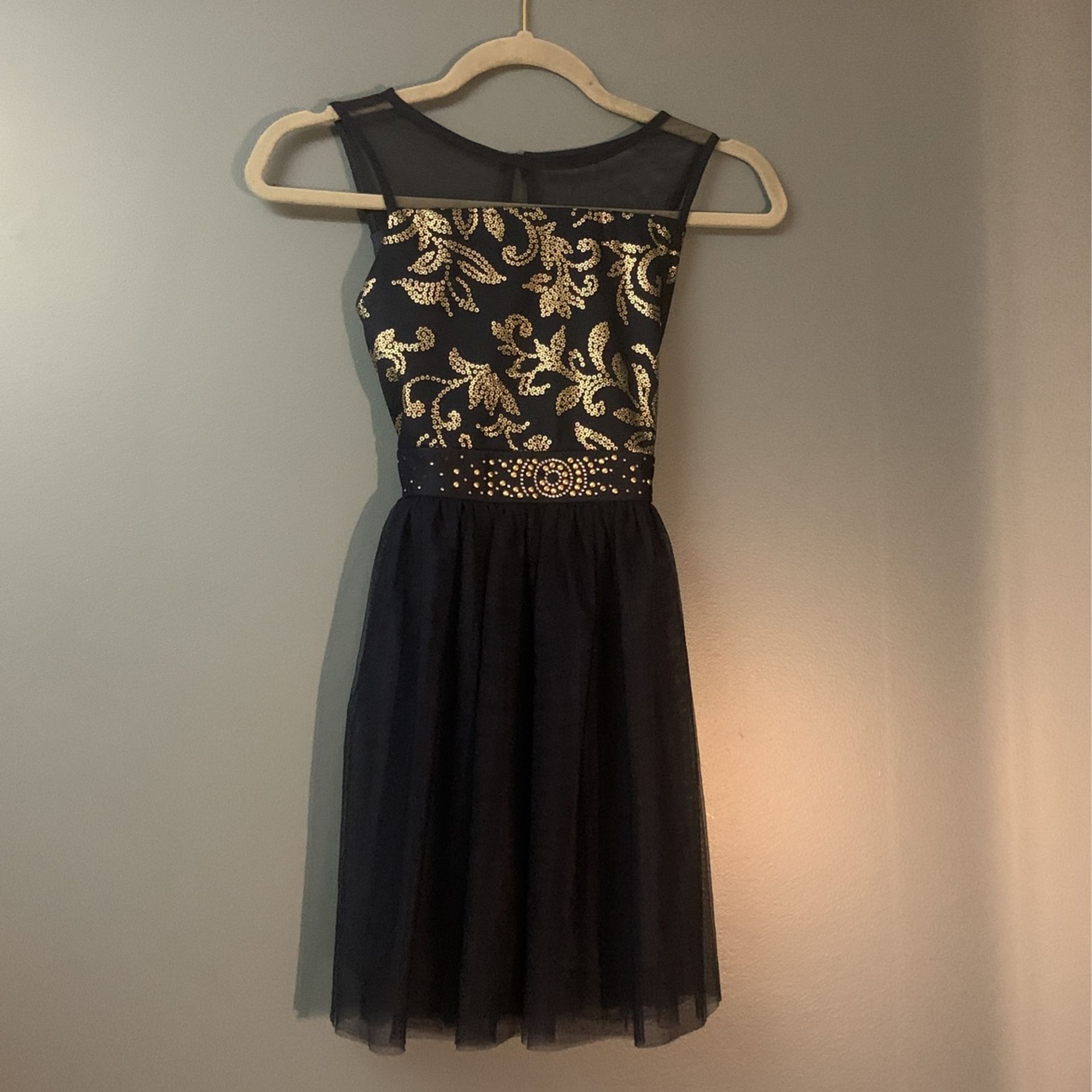 Girls size 10- Gold and a navy blue dress.