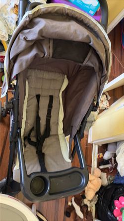 Graco stroller for toddlers or infants , black on the outside grey on the inside
