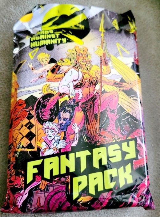 New Sealed 1 Pack CARDS AGAINST HUMANITY FANTASY Expansion Pack. This is a brand new, never opened Cards Against Humanity Fantasy Pack expansion pack.