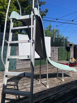 Fiber glass pool slide with working water line