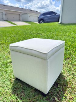 Selling a light-colored storage ottoman, 15 x 15 x 15 inches.