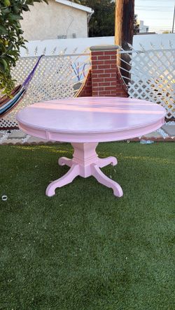 Is a round table pink