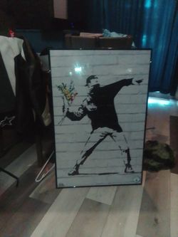 Banksy Flower Thrower Framed Print framed