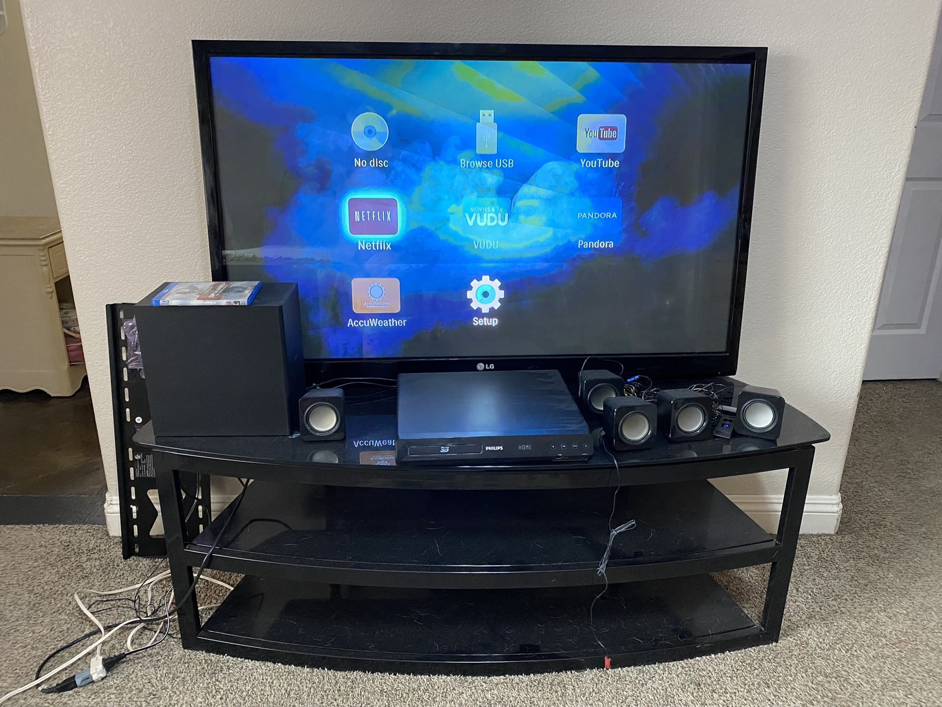 LG 55” Flat Screen TV With Black Glass Three Tier TV Stand