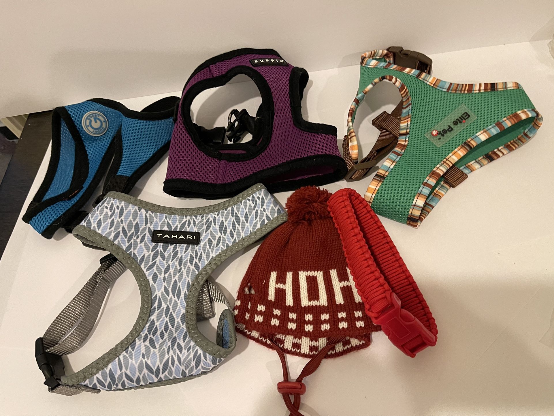 Nice assortment of dog clothing for small pet. Good condition, some never worn.