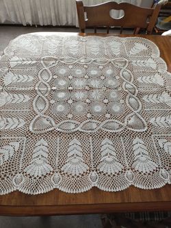 Large table centerpiece 36 x 36. Vinyl but looks like crochet
