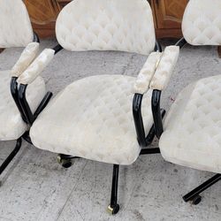 Four Swivel Chairs