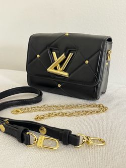 Black handbag with two hand straps