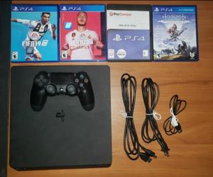 PlayStation 4 1TB with 4 Games and 1 Controller