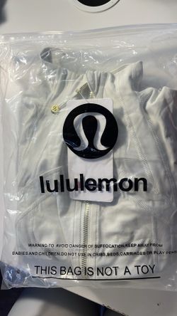Lululemon  ivory gold  and size 4