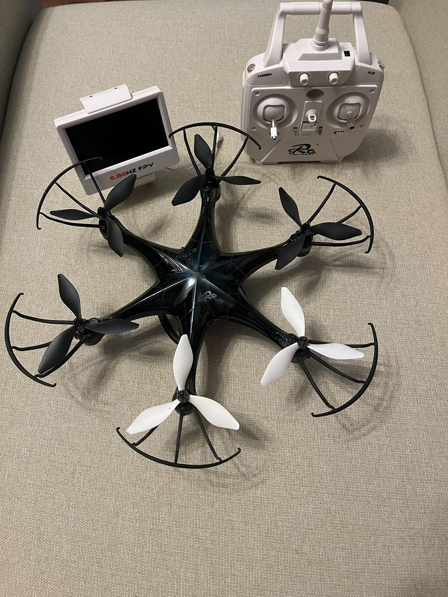 5.8GHz FPV RC Quadcopter with remote control and FPV screen.
