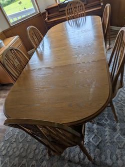8 ft. Oak Dining Room Table / 6 oak chairs  with leaf