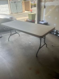6 foot table, portable table.