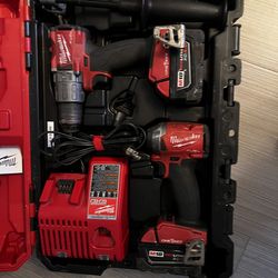 M18 Milwaukee Hammer drill and impact driver with 5.0 batteries