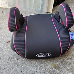 Pink and black Graco booster seat