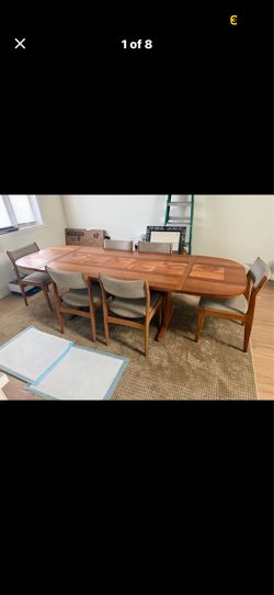 Mid century danish teak and tile dining table and 8 chairs with drop leafs