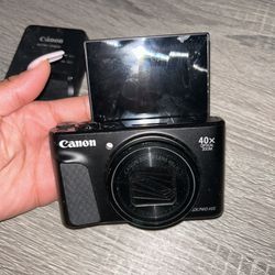 Canon sx740. Charger included. Tripod Separate 