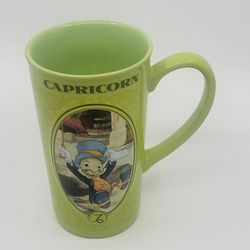 Disney Store Zodiac Capricorn Jiminy Cricket Coffee Tea Latte MUG 16oz 
6" Tall. Pre-owned, good shape, no chips or cracks. It is 6" tall, 
weight Wei