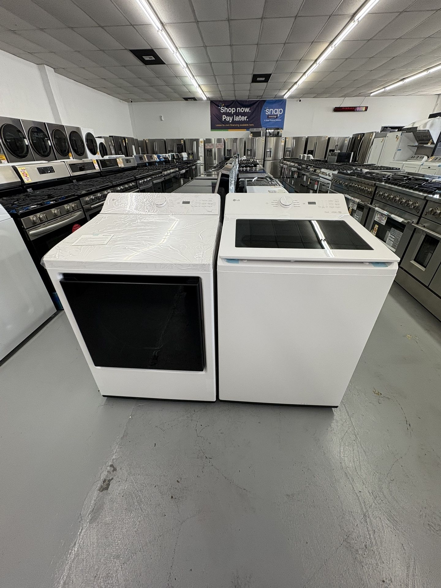 LG 5.0 cu.ft. SMART Top Load Washer in Alpine White with TurboWash And Dryer 7.3 Cu Ft