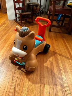 Kids Fisher Price Walk Bounce Ride On like new