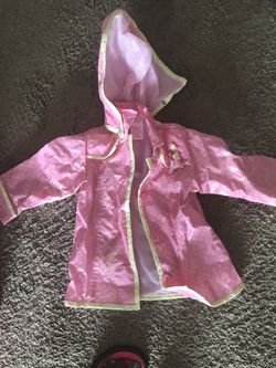 2t raincoat girls with size 6-7 rain boots pink and yellow print.