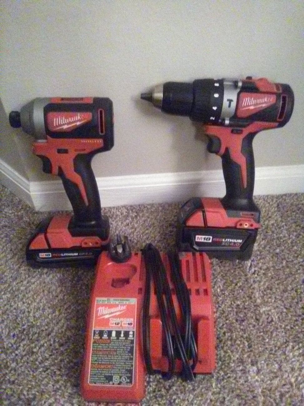 Milwaukee M18 Brushless hammer drill/driver, 1/4" impact, 2 batteries 1-4.0ah, 1-2.0ah, charger and drill bits