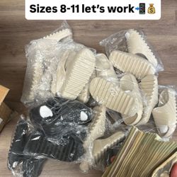 Yeezy Slides (by Adidas x Kanye West).