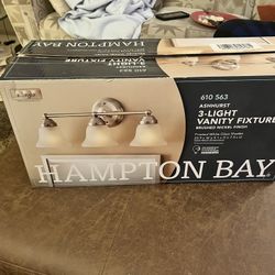 BRAND NEW KOHLER  BATHROOM 3 LIGHT FIXTURE. OLENTANGY RIVER RD AND BETHEL RD PICKUP.