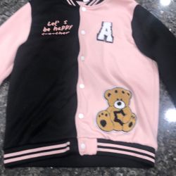 pink and black button jacket