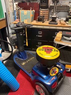 One-of-a-Kind Golden Mobility Scooter — Racing Fan Edition