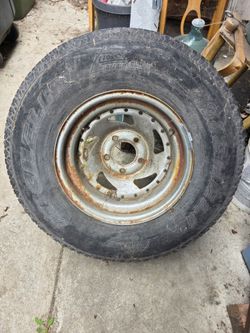 FREE Michelin Tire size P265/70R15 with rim. Good condition.