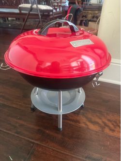 Cuisinart 14-inch Portable Charcoal Grill (Model CCG-190RB, Red).