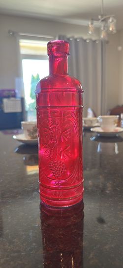 vintage Spanish red glass bottle