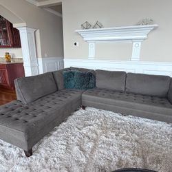 Grey fabric sectional couch
