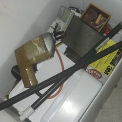 Drill With A Box Of Tools 