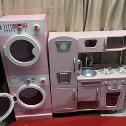 Kids Play Toy Kitchen And Laundry Machine With A Bunch Of Kitchen Toys