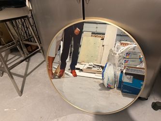 Gold trimmed mirror