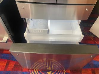 GE four-door stainless steel refrigerator