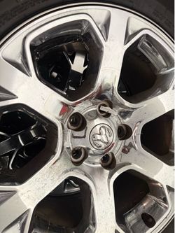 2017 Dodge ram Factory 20 inch rim and tires in great condition. Still look new.