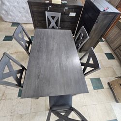 Caitbrook Dining Table and 6 Chairs Set.