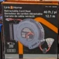 New Linked2Home 40′ Wall Retractable 14/3 Cord Reel. Sells at costco for $60 plus tax.