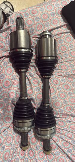 CV axle shaft assemblies