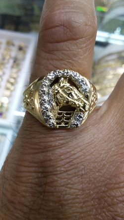 14k Gold ring 7.8 grams & diamonds