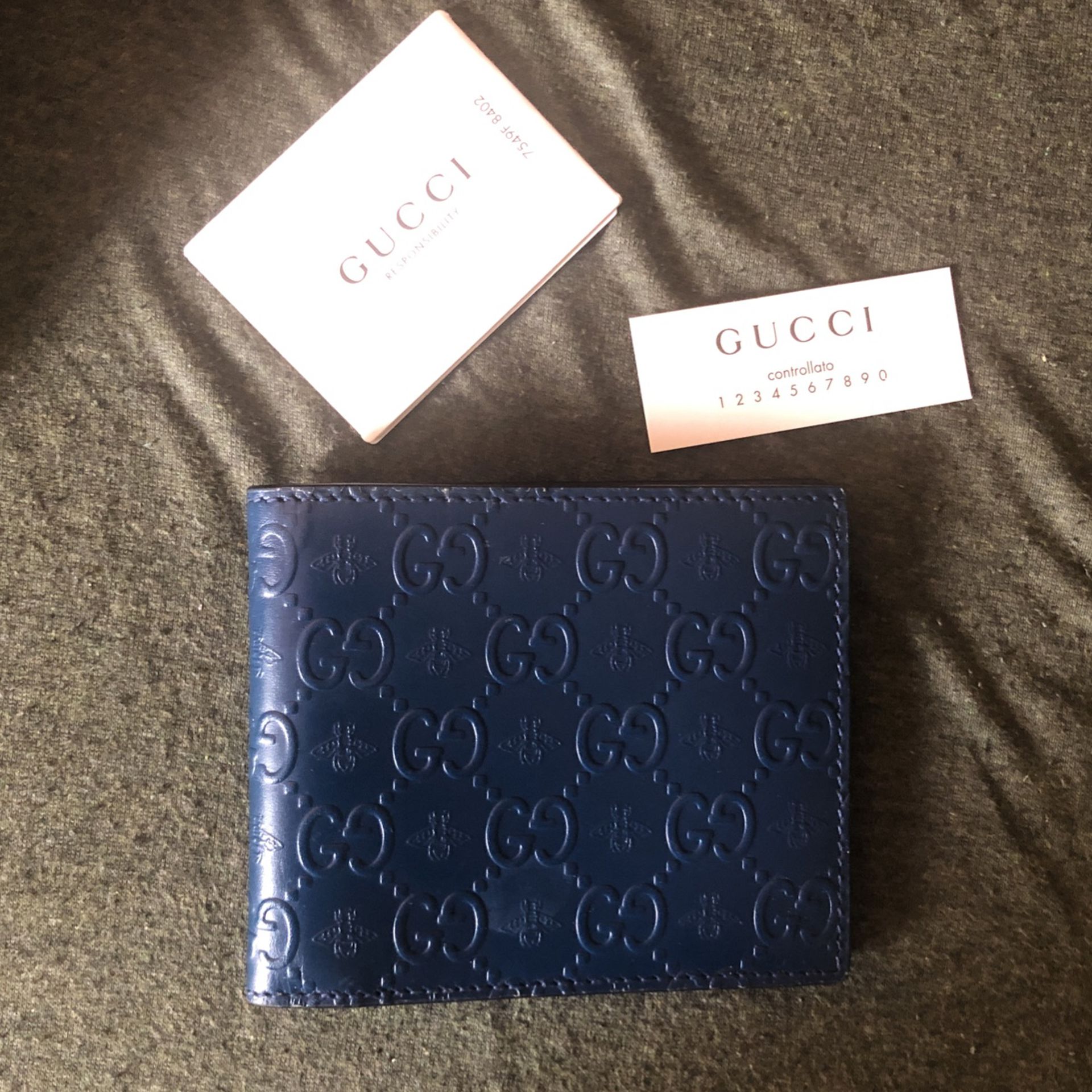 Gucci Signature Leather Bi-Fold Wallet 