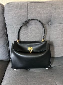 Black leather bag in size small.