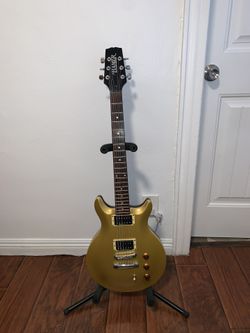 Electric Guitar Gold Maple Top / Mahogany Wood