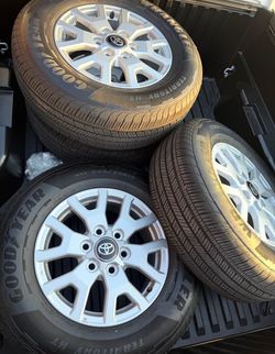 2026 Toyota Tacoma Genuine Factory 17 Tires Goodyear OEM Rims Toyota Logo
